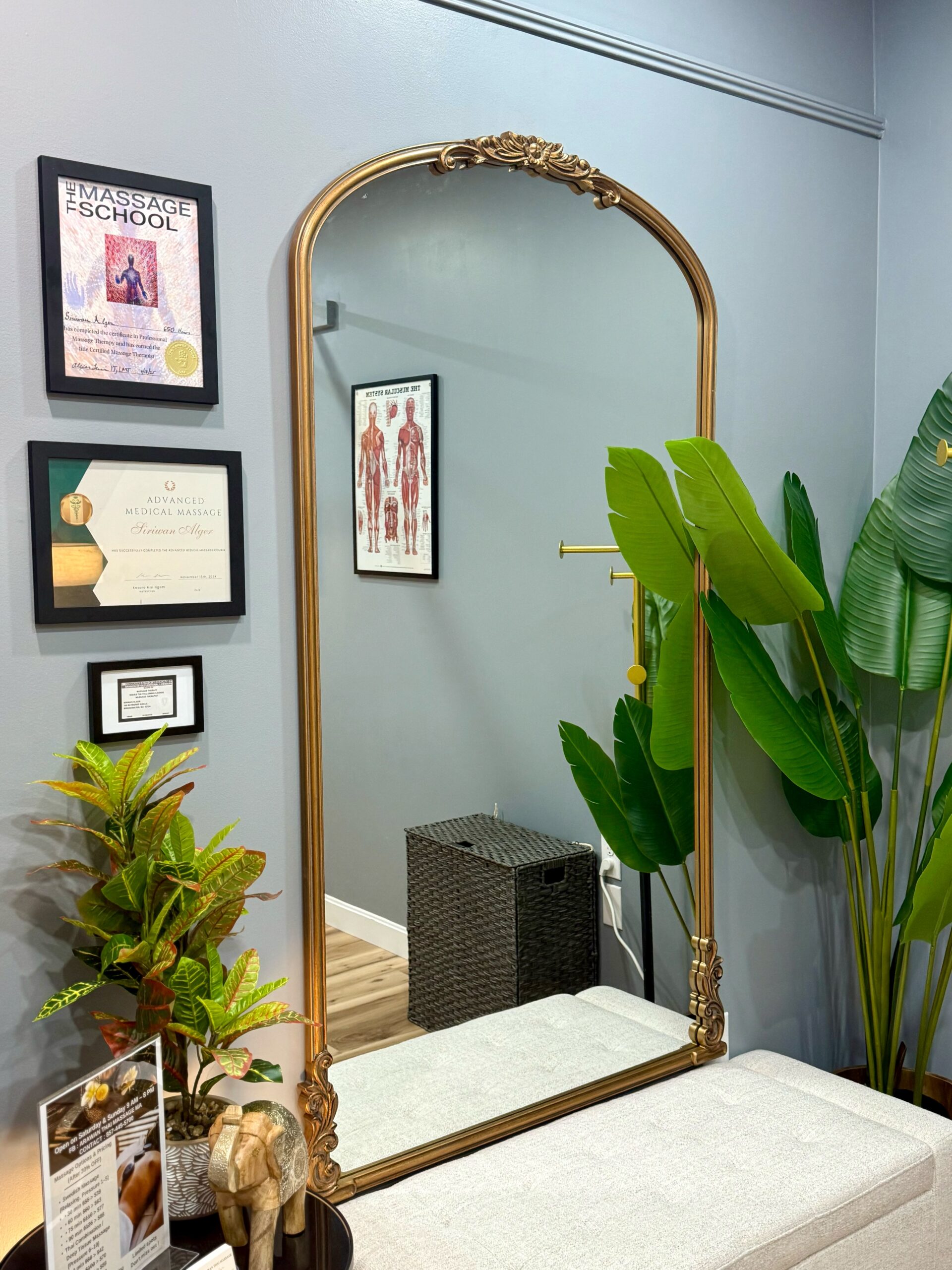 A mirror next to certificates.